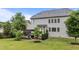 Beautiful backyard showcasing a well-manicured lawn and a spacious deck, perfect for outdoor living at 19 Arch Oak Ct, Clayton, NC 27527