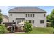 Rear exterior of the home highlights a spacious deck and well-manicured backyard at 19 Arch Oak Ct, Clayton, NC 27527