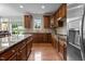 Well-appointed kitchen with granite countertops, stainless steel appliances, and ample cabinets at 19 Arch Oak Ct, Clayton, NC 27527