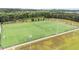 Aerial shot of several soccer fields, showcasing the community's sports facilities, surrounded by lush greenery at 19 Arch Oak Ct, Clayton, NC 27527