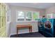 Bright laundry room area with washer and dryer set with natural light at 1915 James St, Durham, NC 27707