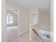 Upstairs hallway with carpet and doors, offering access to different rooms at 1928 Shadow Glen Dr, Raleigh, NC 27604