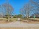 Inviting park entrance with paved pathway and shade trees at 1928 Shadow Glen Dr, Raleigh, NC 27604