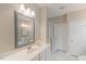 Elegant bathroom with dual vanity, large mirror, and walk-in shower at 1930 Briar Chapel Pkwy, Chapel Hill, NC 27516