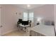 Bedroom featuring a single bed, desk and chair for work, and bookshelves at 1930 Briar Chapel Pkwy, Chapel Hill, NC 27516