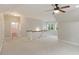 Spacious bonus room with staircase and neutral color palette at 1930 Briar Chapel Pkwy, Chapel Hill, NC 27516