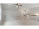 Large bonus room with neutral colors, ceiling fan, and plenty of space at 1930 Briar Chapel Pkwy, Chapel Hill, NC 27516