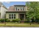 Charming two-story home with a well-manicured lawn and beautiful landscaping at 1930 Briar Chapel Pkwy, Chapel Hill, NC 27516