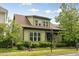 This cozy home has a well-manicured lawn and lush landscaping at 1930 Briar Chapel Pkwy, Chapel Hill, NC 27516