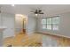 Open living space with hardwood floors, bright windows, and neutral decor at 1930 Briar Chapel Pkwy, Chapel Hill, NC 27516
