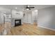 Spacious living room with a fireplace, hardwood floors, and open layout at 1930 Briar Chapel Pkwy, Chapel Hill, NC 27516