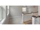 Open loft area with natural light and plush carpeting at 1930 Briar Chapel Pkwy, Chapel Hill, NC 27516