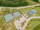 Aerial shot of community recreational area with tennis and basketball courts, and clubhouse at 1930 Briar Chapel Pkwy, Chapel Hill, NC 27516