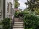 Comfortable front porch with seating, overlooking the street, adds character and curb appeal to this home at 1930 Reid St, Raleigh, NC 27608