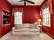 Inviting living room with built-in shelving, a comfortable sofa, and natural light at 1930 Reid St, Raleigh, NC 27608