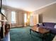 Spacious living room with a fireplace and plush seating arrangements at 1930 Reid St, Raleigh, NC 27608