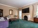 Cozy living room featuring a fireplace and comfortable seating at 1930 Reid St, Raleigh, NC 27608