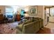 Comfortable living room with plush sofa, hardwood floors, and natural light at 1930 Reid St, Raleigh, NC 27608