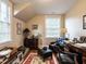 Home office with hardwood floors, classic desk, and natural light at 1930 Reid St, Raleigh, NC 27608