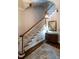 Elegant staircase featuring dark wood treads and white risers at 1930 Reid St, Raleigh, NC 27608