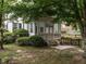 Sun room features ample natural light, perfect for relaxation, and is surrounded by lush greenery at 1930 Reid St, Raleigh, NC 27608