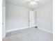 Neutral bedroom with plush carpeting, light walls, and white trim provides a relaxing retreat at 203 S South Bend Dr, Durham, NC 27713