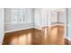 Dining area with hardwood floors, light gray walls, and lots of natural light at 203 S South Bend Dr, Durham, NC 27713