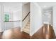 Spacious second story hallway boasts hardwood floors, and leads to carpeted stairs at 203 S South Bend Dr, Durham, NC 27713