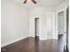 Bedroom with hardwood floors, recessed lights, a ceiling fan and access to the ensuite bathroom and walk in closet at 203 South Bend Dr, Durham, NC 27713