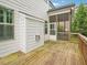 Wood deck with screening, windows, and white exterior at 203 South Bend Dr, Durham, NC 27713