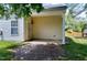 Back patio with brick design, and outdoor entry to home at 204 Southern Style Dr, Holly Springs, NC 27540