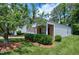 Charming home with lush landscaping and a well-maintained yard at 204 Southern Style Dr, Holly Springs, NC 27540