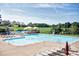 Large community pool with water slide at 204 Southern Style Dr, Holly Springs, NC 27540