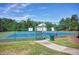 Community tennis courts on a sunny day at 204 Southern Style Dr, Holly Springs, NC 27540