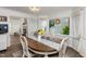 Charming dining room with a bay window and decorative accents at 210 Dutchess Dr, Cary, NC 27513