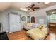 Cozy living room with a unique storage unit, comfortable seating, and lots of natural light at 210 Dutchess Dr, Cary, NC 27513