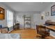 Bedroom with hardwood floors, good natural light, neutral paint and multiple desk/work areas at 2125 Cheek Rd, Durham, NC 27704