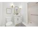 Modern bathroom features white vanity, shower, and stylish fixtures at 2209 The Circle, Raleigh, NC 27608