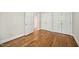 Bedroom with hardwood floors and closet at 2209 The Circle, Raleigh, NC 27608