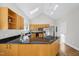 Kitchen featuring stainless appliances, ample storage, and bright skylight overhead at 2209 The Circle, Raleigh, NC 27608