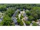 Bird's eye view of the neighborhood showing the landscaped streets and mature trees at 2309 Filigree Ct, Raleigh, NC 27614