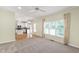 Open living room with fireplace flows into a bright kitchen, great for entertaining at 2309 Filigree Ct, Raleigh, NC 27614