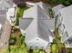 An aerial view shows a lovely home with a gray roof and mature landscaping at 2309 Yancey St, Raleigh, NC 27608