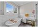 Bright bathroom featuring a soaking tub, white subway tile, and vanity near window at 2309 Yancey St, Raleigh, NC 27608