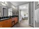 Modern bathroom features dual sinks, granite counters, soaking tub and vanity area at 2309 Yancey St, Raleigh, NC 27608