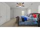 Bedroom with a ceiling fan and natural light, offering a calm and inviting space at 2309 Yancey St, Raleigh, NC 27608