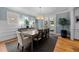 Elegant dining room with sophisticated decor, natural light, and a hardwood floor at 2309 Yancey St, Raleigh, NC 27608