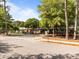 Daytime exterior view of the school with trees and an empty parking lot at 2309 Yancey St, Raleigh, NC 27608