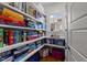 A brightly lit game room has board games stored on shelves at 2309 Yancey St, Raleigh, NC 27608