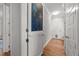 Hallway with a chalkboard accent wall and multiple doors, adding character and functionality at 2309 Yancey St, Raleigh, NC 27608